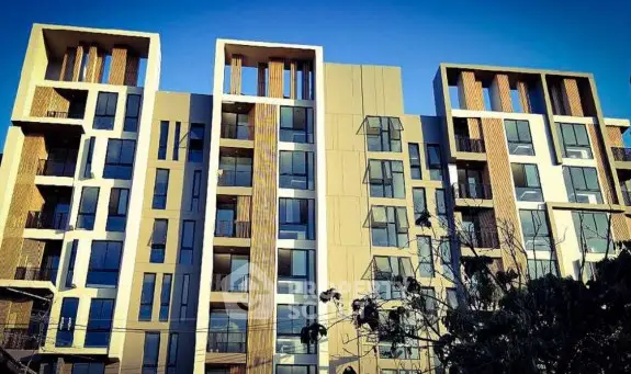 Modern architectural building with large windows and unique design