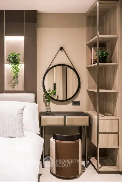 Modern bedroom with stylish decor and elegant shelving unit