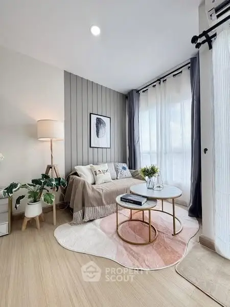 Chic modern living room with cozy decor and natural light