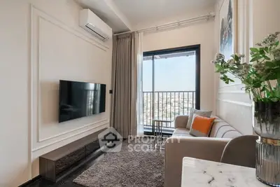 Modern living room with balcony view, stylish decor, and wall-mounted TV in a cozy apartment.