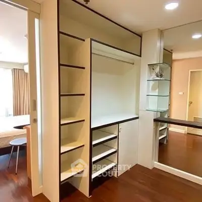 Modern apartment interior with built-in storage and sleek design