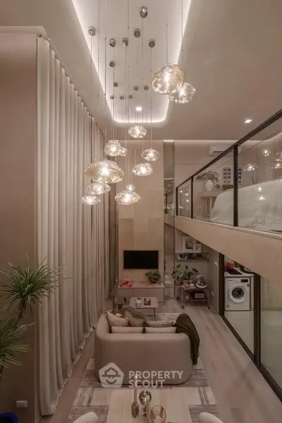 Luxurious modern living room with high ceilings, elegant lighting, and mezzanine bedroom in stylish apartment.