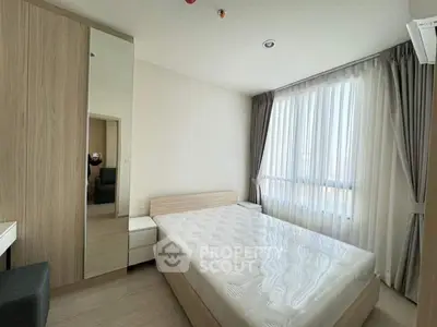 Modern bedroom with large window and minimalist design