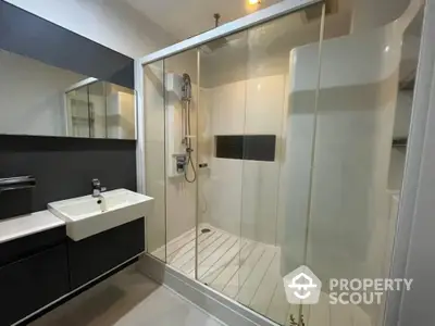 Modern bathroom with spacious shower and sleek design