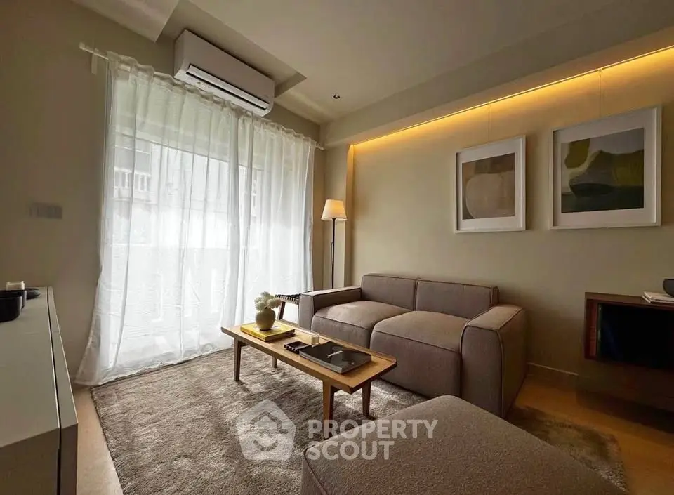 Stylish modern living room with cozy sofa and elegant decor