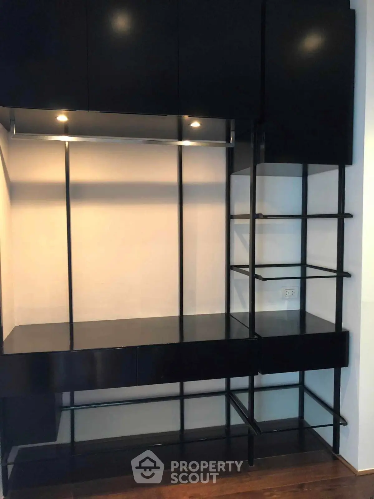 Modern black shelving unit with sleek design and ample storage space