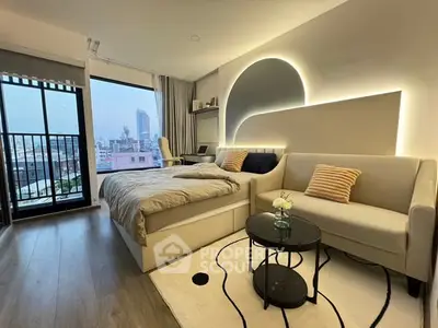 Modern studio apartment with stylish decor and city view