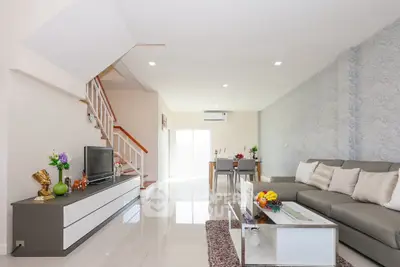 Spacious modern living room with elegant decor and natural light