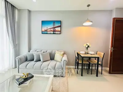 Modern living room with elegant decor and cozy dining area