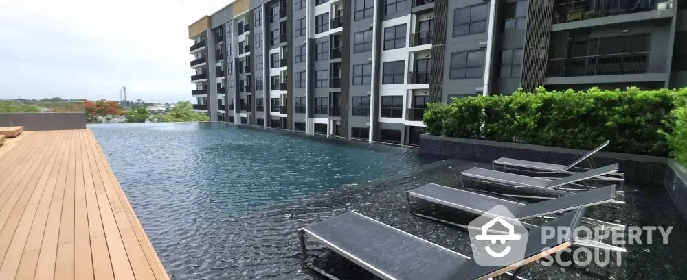 Luxurious rooftop pool with modern apartment building view