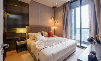 Luxurious bedroom with floor-to-ceiling windows and elegant decor