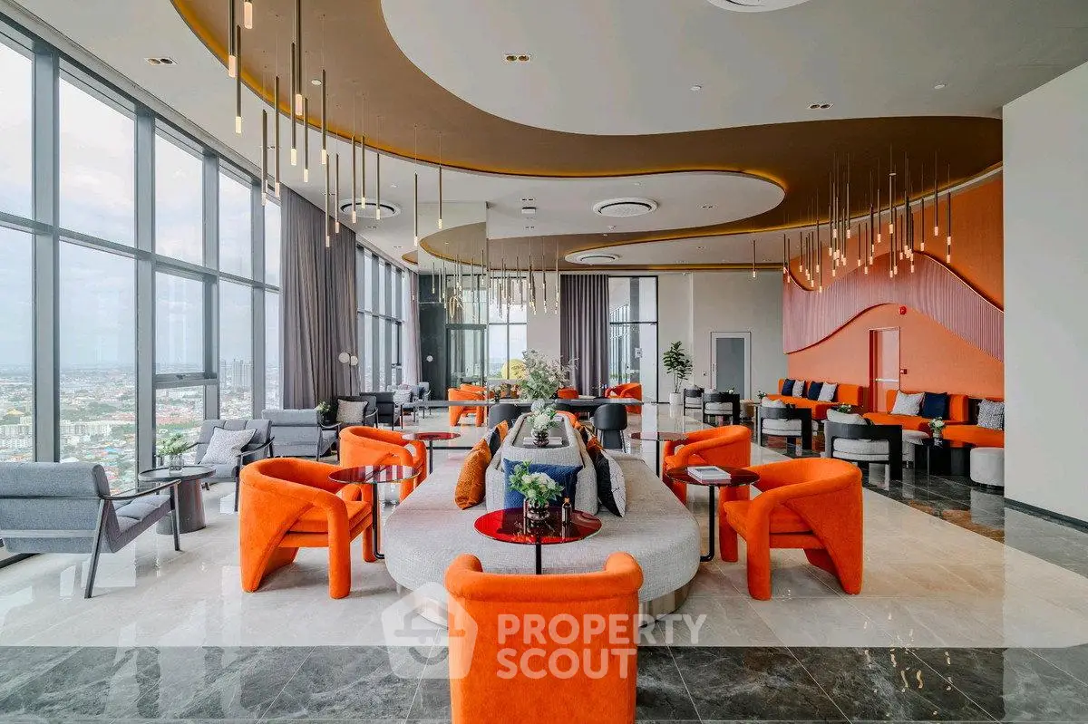Luxurious modern living room with panoramic city views and stylish orange seating