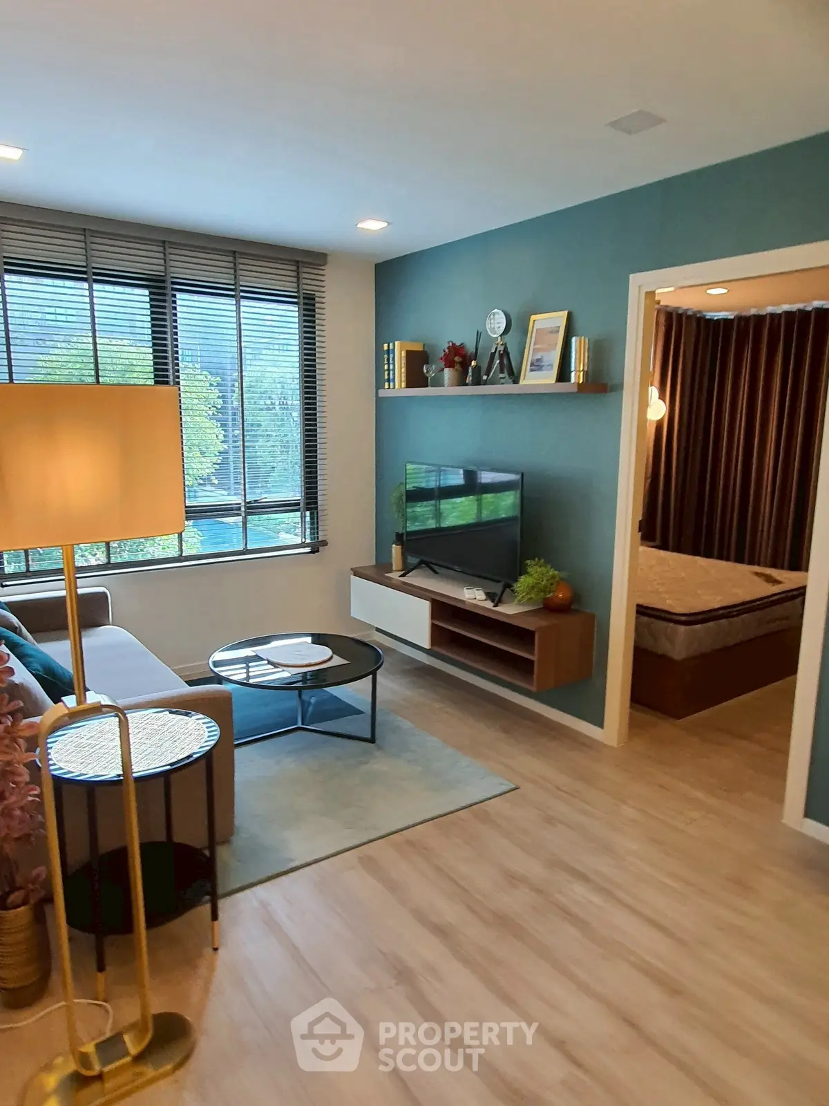 Modern living room with stylish decor and large window view