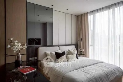 Luxurious modern bedroom with floor-to-ceiling windows and elegant decor.