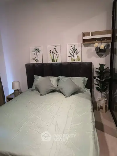 Cozy bedroom with elegant decor and plush bedding, perfect for relaxation and comfort.