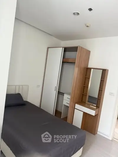 Modern bedroom with sleek furniture and minimalist design