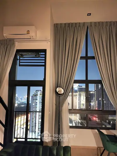 Stunning high-rise apartment with floor-to-ceiling windows offering breathtaking city views at dusk.