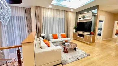 Luxurious modern living room with elegant decor and large windows