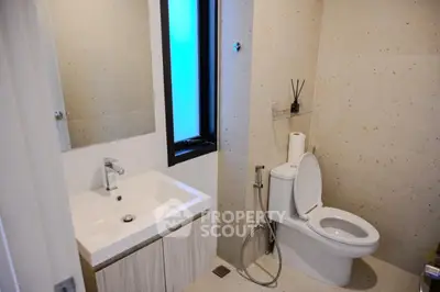 Modern bathroom with sleek fixtures and natural light