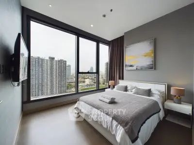 Luxurious bedroom with stunning city view and modern decor
