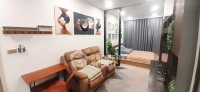 Modern apartment interior with cozy living room and stylish bedroom