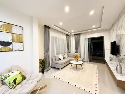 Modern living room with elegant decor and spacious layout