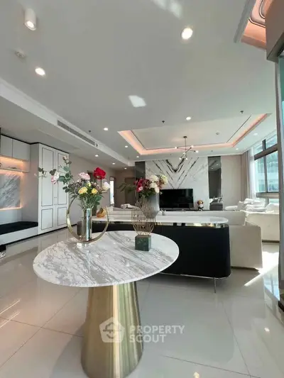 Luxurious modern living room with marble accents and elegant decor