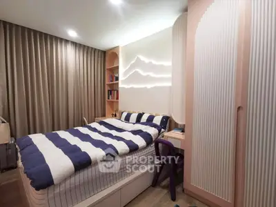 Modern bedroom with stylish lighting and cozy decor