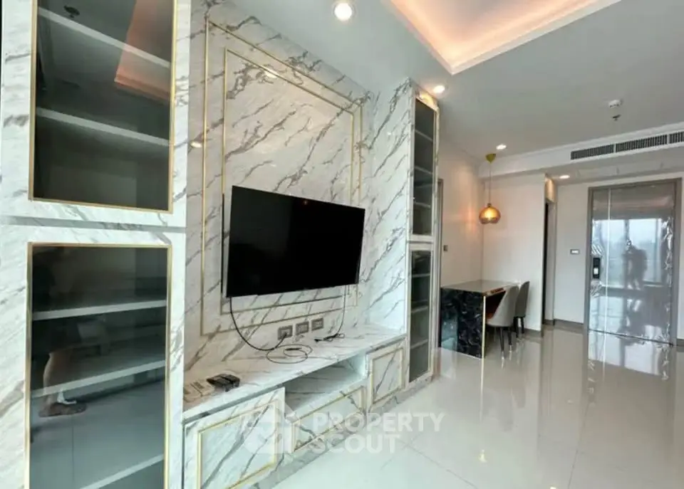 Luxurious modern living room with marble accents and sleek TV setup