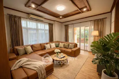 Luxurious living room with elegant decor and spacious seating area