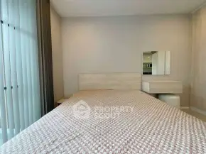 Cozy bedroom with modern decor and natural light