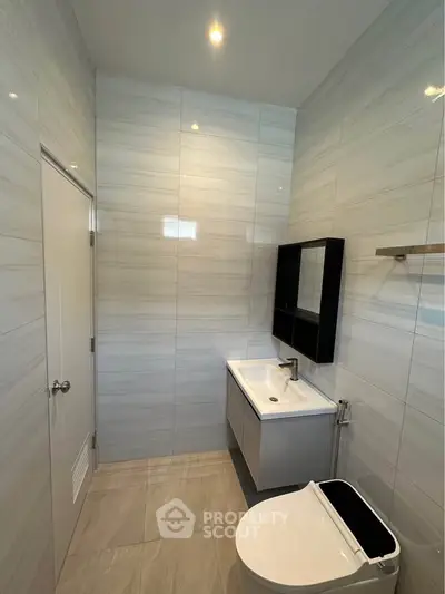 Modern bathroom with sleek fixtures and elegant tile design