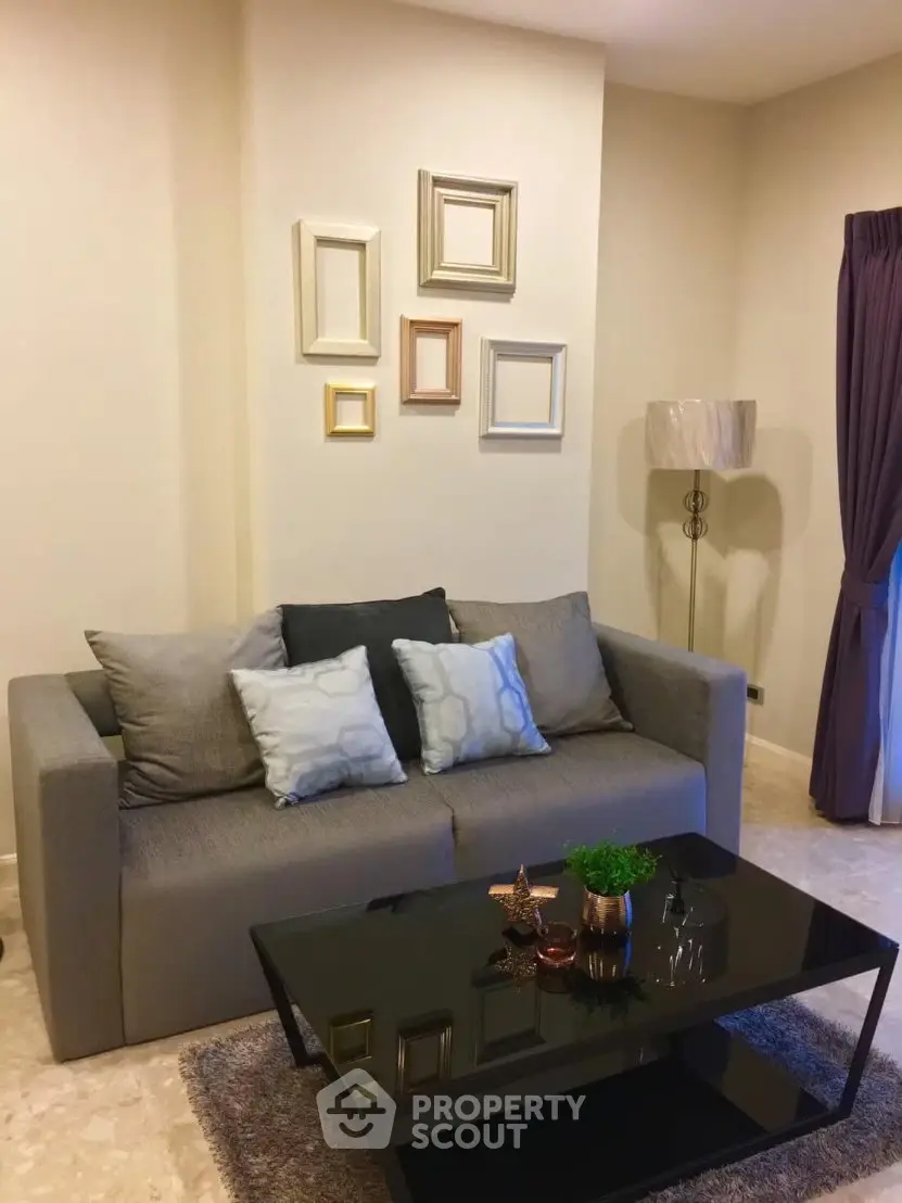 Cozy living room with modern decor and stylish furniture, perfect for relaxation and entertaining guests.