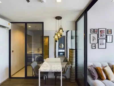 Modern living room with glass partition and stylish decor