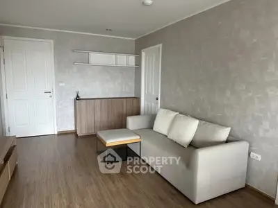 Modern living room with minimalist design and neutral tones