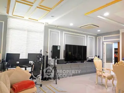 Luxurious living room with elegant decor and modern entertainment setup
