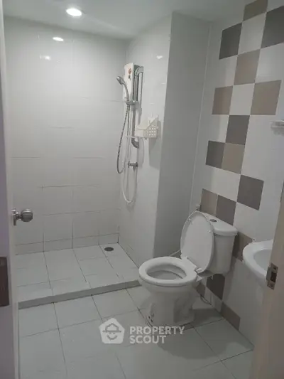 Modern bathroom with sleek shower and stylish tile design