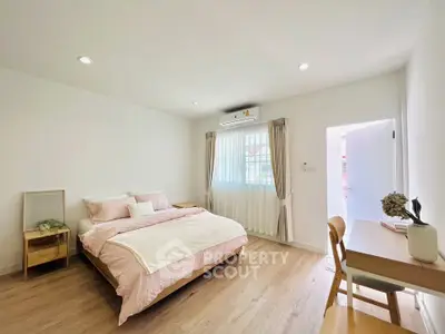 Bright and airy bedroom with modern decor and natural light