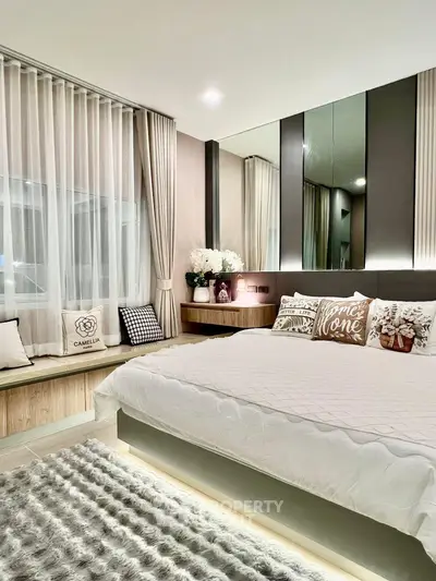 Luxurious modern bedroom with elegant decor and cozy ambiance