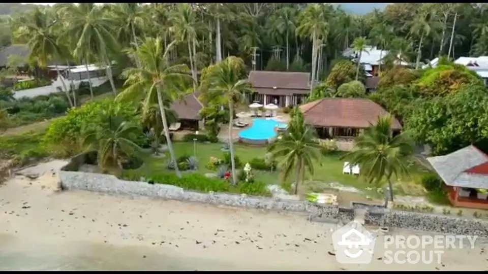 Stunning beachfront villa with pool and lush tropical garden