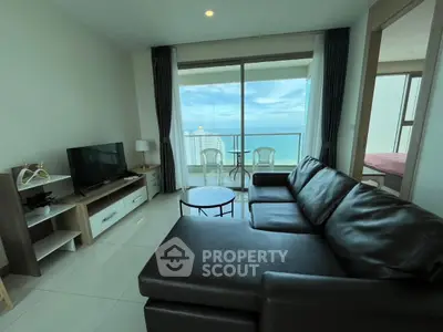 Modern living room with ocean view and balcony access