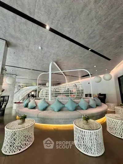 Luxurious modern living room with unique circular seating and stylish decor