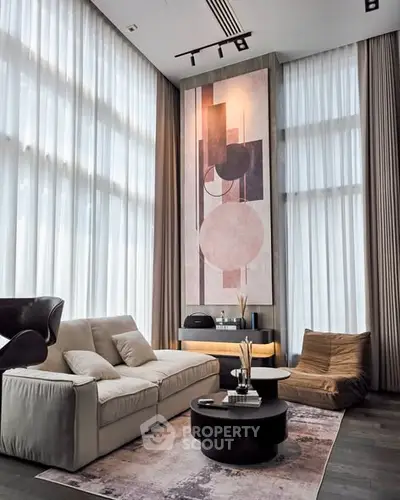 Luxurious modern living room with high ceilings and elegant decor