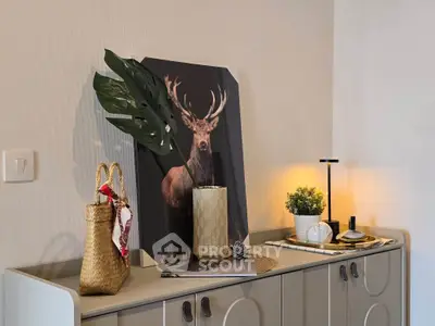 Stylish interior decor with modern cabinet and elegant accessories in a cozy living space.
