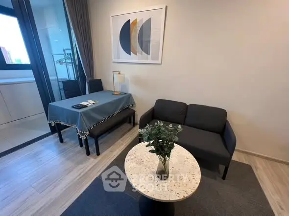 Modern living room with stylish decor and cozy seating area.