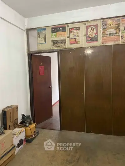 Cozy storage room with vintage decor and wooden sliding doors