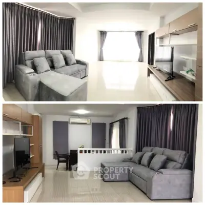 Spacious modern living room with sleek furniture and abundant natural light.
