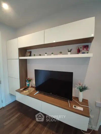 Modern living room with sleek TV unit and stylish decor
