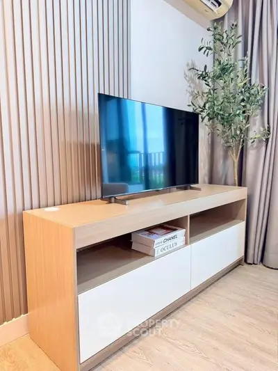 Modern living room with sleek TV stand and stylish decor