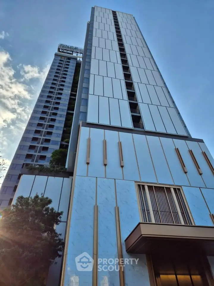 Stunning modern high-rise building with sleek architectural design and panoramic city views.